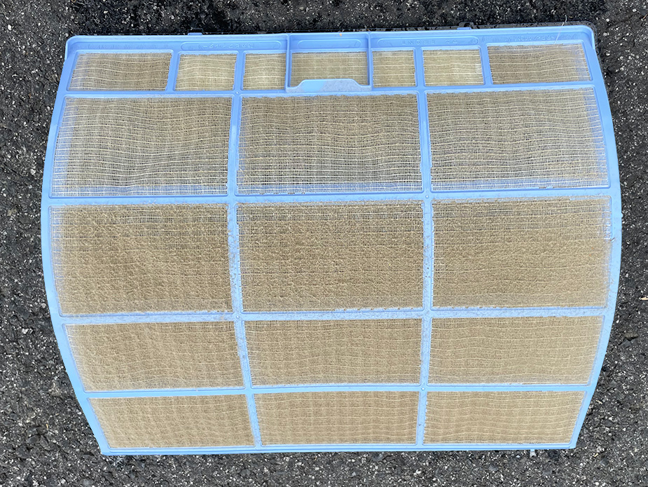 Image of air conditioner filter before maintenance
